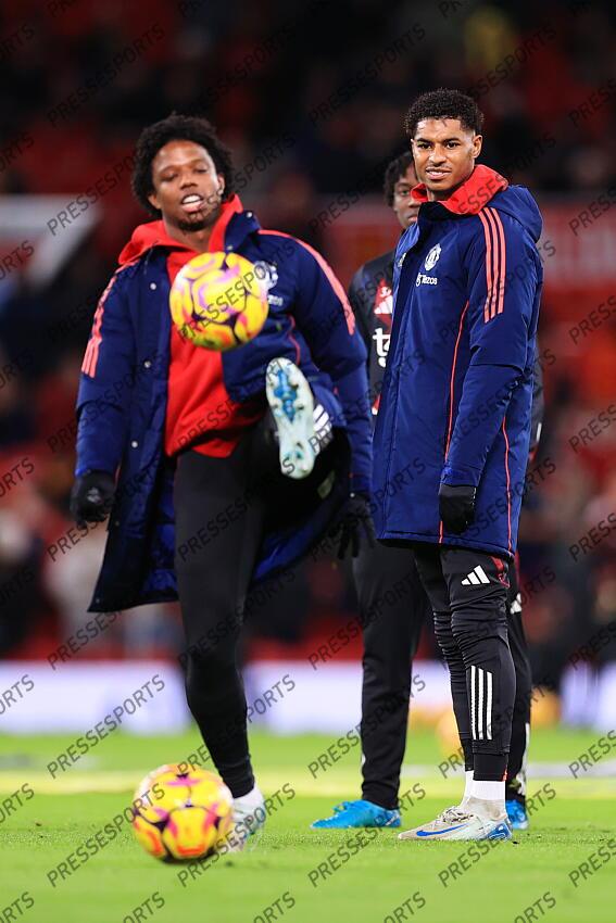 30th December 2024 - Premier League - Manchester United v Newcastle United - Marcus Rashford of Manchester United laughs and smiles as he warms up - Photo: Simon Stacpoole / Offside. MANCHESTER UNITED-NEWCASTLE UNITED (0-2) 