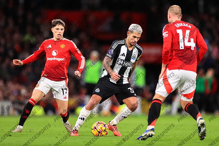 30th December 2024 - Premier League - Manchester United v Newcastle United - Bruno Guimaraes of Newcastle United takes on Christian Eriksen of Manchester United - Photo: Simon Stacpoole / Offside. MANCHESTER UNITED-NEWCASTLE UNITED (0-2) 