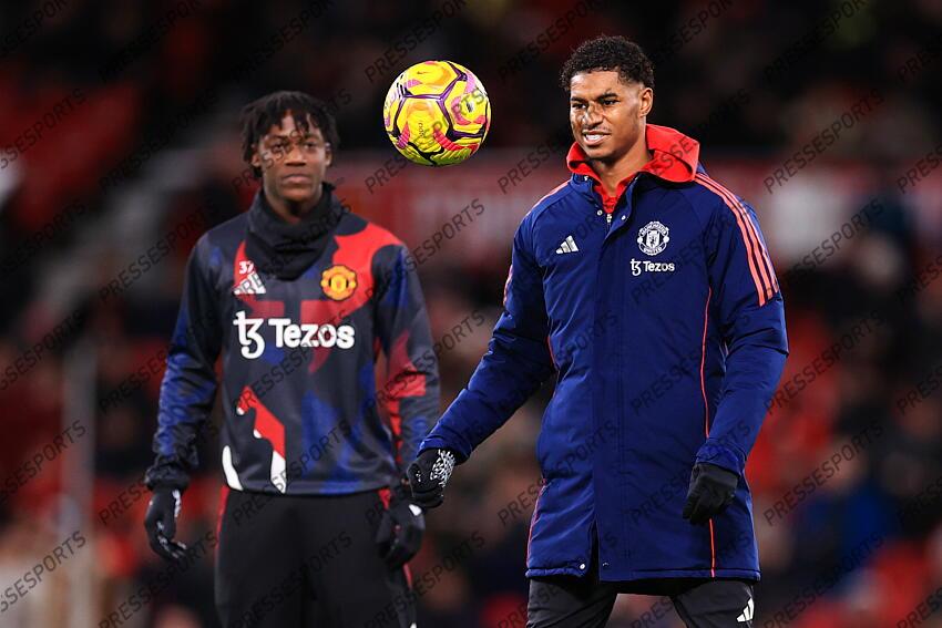 30th December 2024 - Premier League - Manchester United v Newcastle United - Marcus Rashford of Manchester United warms up with Kobbie Mainoo of Manchester United - Photo: Simon Stacpoole / Offside. MANCHESTER UNITED-NEWCASTLE UNITED (0-2) 
