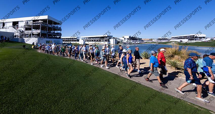 Feb 6, 2025; Scottsdale, Arizona, USA; Fans walk from hole 17 to hole 18 during the first round of the WM Phoenix Open golf tournament. Mandatory Credit: Aryanna Frank-Imagn Images PGA: WM Phoenix Open - First Round 