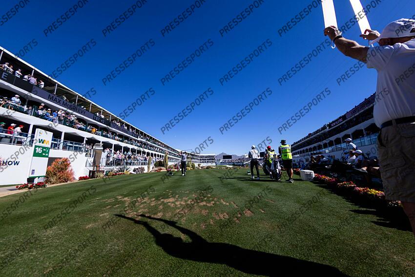 Feb 6, 2025; Scottsdale, Arizona, USA; Max McGreevy of the United States hits the ball off of the tee at hole 16 during the first round of the WM Phoenix Open golf tournament. Mandatory Credit: Aryanna Frank-Imagn Images PGA: WM Phoenix Open - First Round 