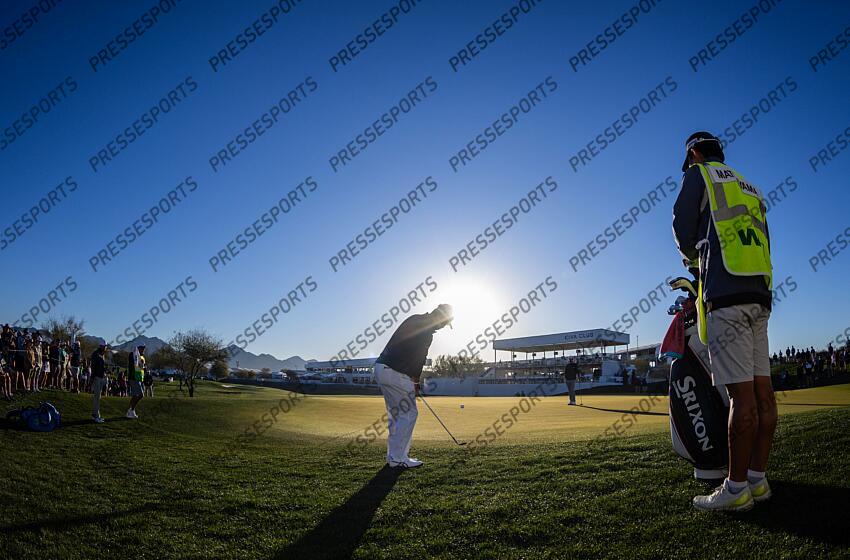 Feb 6, 2025; Scottsdale, Arizona, USA; Hideki Matsuyama plays a shot on the 10th hole during the first round of the WM Phoenix Open golf tournament. Mandatory Credit: Aryanna Frank-Imagn Images PGA: WM Phoenix Open - First Round 