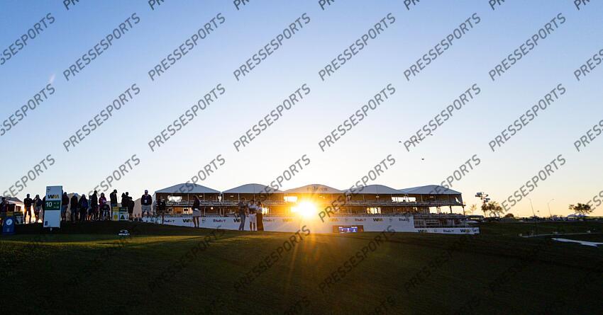 Feb 6, 2025; Scottsdale, Arizona, USA; The sun comes through hole 10 in the morning after group 13 tees off during the first round of the WM Phoenix Open golf tournament. Mandatory Credit: Aryanna Frank-Imagn Images PGA: WM Phoenix Open - First Round 