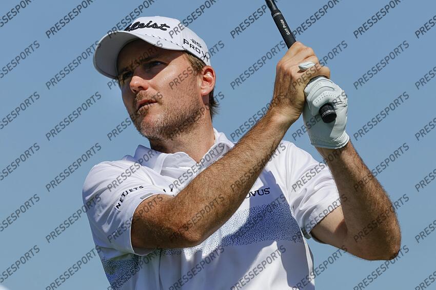 Feb 28, 2025; Palm Beach Gardens, Florida, USA; Russell Henley plays his shot from the fourth tee during the second round of the Cognizant Classic in The Palm Beaches golf tournament. Mandatory Credit: Reinhold Matay-Imagn Images PGA: Cognizant Classic in The Palm Beaches - Second Round 