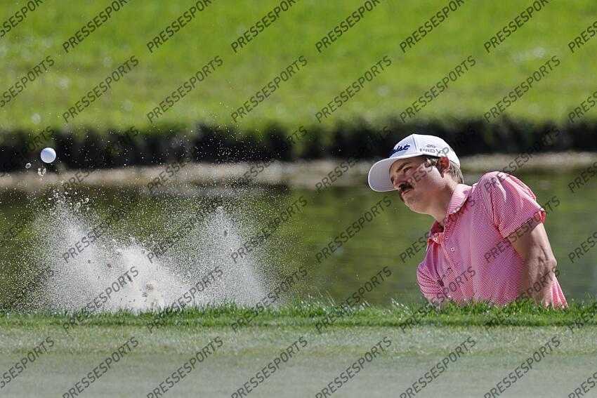 Feb 28, 2025; Palm Beach Gardens, Florida, USA; Carson Young plays a shot from a bunker on the 16th hole during the second round of the Cognizant Classic in The Palm Beaches golf tournament. Mandatory Credit: Reinhold Matay-Imagn Images PGA: Cognizant Classic in The Palm Beaches - Second Round 