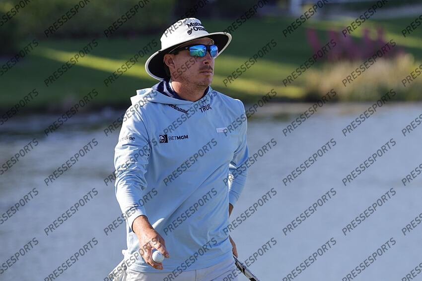 Feb 28, 2025; Palm Beach Gardens, Florida, USA; Joel Dahmen walks off of the on the 16th green during the second round of the Cognizant Classic in The Palm Beaches golf tournament. Mandatory Credit: Reinhold Matay-Imagn Images PGA: Cognizant Classic in The Palm Beaches - Second Round 