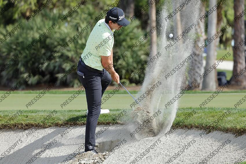 Feb 27, 2025; Palm Beach Gardens, Florida, USA; Nico Echavarria hits from a bunker on the third hole during the first round of the Cognizant Classic in The Palm Beaches golf tournament. Mandatory Credit: Reinhold Matay-Imagn Images PGA: Cognizant Classic in The Palm Beaches - First Round 