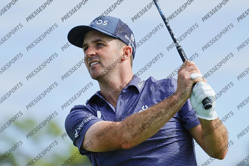 Feb 27, 2025; Palm Beach Gardens, Florida, USA; Denny McCarthy plays his shot from the fourth tee during the first round of the Cognizant Classic in The Palm Beaches golf tournament. Mandatory Credit: Reinhold Matay-Imagn Images PGA: Cognizant Classic in The Palm Beaches - First Round 
