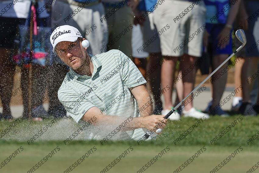 Feb 27, 2025; Palm Beach Gardens, Florida, USA; Russell Henley hits from the bunker on the third hole during the first round of the Cognizant Classic in The Palm Beaches golf tournament. Mandatory Credit: Reinhold Matay-Imagn Images PGA: Cognizant Classic in The Palm Beaches - First Round 