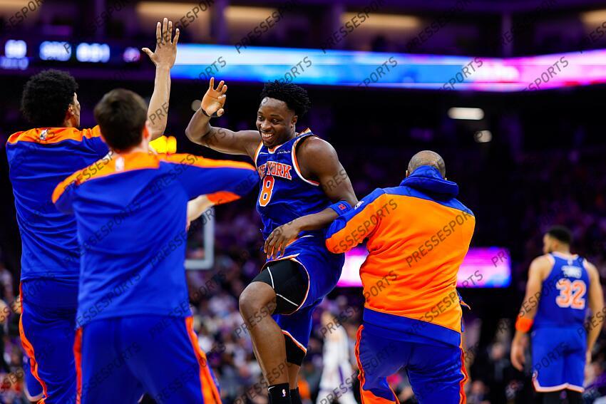 Mar 10, 2025; Sacramento, California, USA; New York Knicks forward OG Anunoby (8) celebrates with teammates after a play during the third quarter against the Sacramento Kings at Golden 1 Center. Mandatory Credit: Sergio Estrada-Imagn Images NBA: New York Knicks at Sacramento Kings 