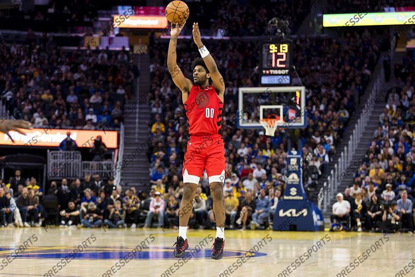 Mar 10, 2025; San Francisco, California, USA; Portland Trail Blazers guard Scoot Henderson (00) takes a three-point shot against the Golden State Warriors during the fourth quarter at Chase Center. Mandatory Credit: John Hefti-Imagn Images NBA: Portland Trail Blazers at Golden State Warriors 