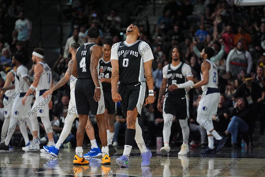 Mar 10, 2025; San Antonio, Texas, USA; San Antonio Spurs forward Keldon Johnson (0) celebrates in the second half against the Dallas Mavericks at Frost Bank Center. Mandatory Credit: Daniel Dunn-Imagn Images NBA: Dallas Mavericks at San Antonio Spurs 