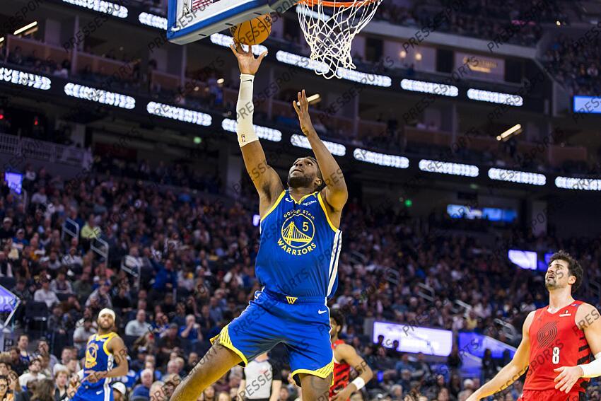 Mar 10, 2025; San Francisco, California, USA; Golden State Warriors forward Kevon Looney (5) shoots against the Portland Trail Blazers during the second quarter at Chase Center. Mandatory Credit: John Hefti-Imagn Images NBA: Portland Trail Blazers at Golden State Warriors 