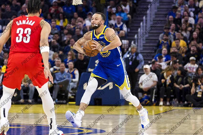 Mar 10, 2025; San Francisco, California, USA; Golden State Warriors guard Stephen Curry (30) passes against the Portland Trail Blazers during the second quarter at Chase Center. Mandatory Credit: John Hefti-Imagn Images NBA: Portland Trail Blazers at Golden State Warriors 