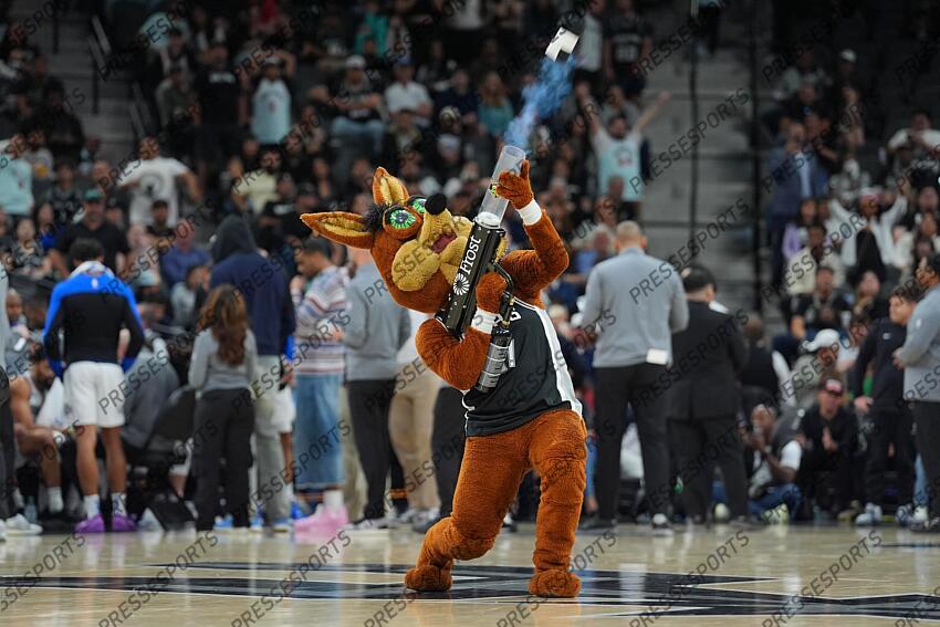 Mar 10, 2025; San Antonio, Texas, USA; The San Antonio Spurs Coyote performs in the second half against the Dallas Mavericks at Frost Bank Center. Mandatory Credit: Daniel Dunn-Imagn Images NBA: Dallas Mavericks at San Antonio Spurs 