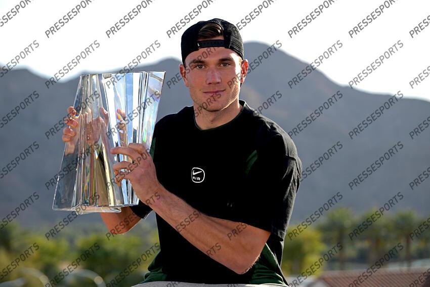Mar 16, 2025; Indian Wells, CA, USA; Jack Draper (GBR) holds the championship trophy after defeating Holger Rune (not pictured) in the final of the BNP Paribas Open at the Indian Well Tennis Garden. Mandatory Credit: Jayne Kamin-Oncea-Imagn Images Tennis: BNP Paribas Open-Day 15 