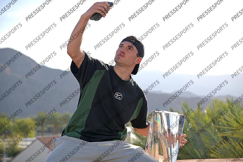 Mar 16, 2025; Indian Wells, CA, USA; Jack Draper (GBR) takes a selfie with the championship trophy after defeating Holger Rune (not pictured) in the final of the BNP Paribas Open at the Indian Well Tennis Garden. Mandatory Credit: Jayne Kamin-Oncea-Imagn Images Tennis: BNP Paribas Open-Day 15 