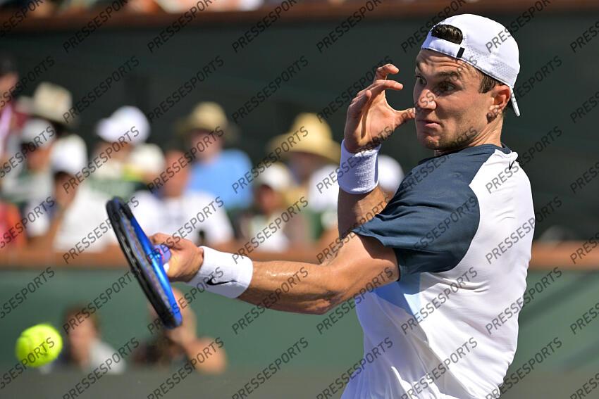 Mar 16, 2025; Indian Wells, CA, USA; Jack Draper (GBR) hits a shot as he defeated Holger Rune (not pictured) in the men 