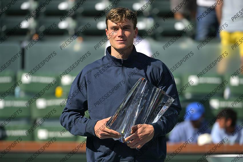 Mar 16, 2025; Indian Wells, CA, USA; Jack Draper (GBR) holds the championship trophy after defeating Holger Rune (not pictured) in the final of the BNP Paribas Open at the Indian Well Tennis Garden. Mandatory Credit: Jayne Kamin-Oncea-Imagn Images Tennis: BNP Paribas Open-Day 15 