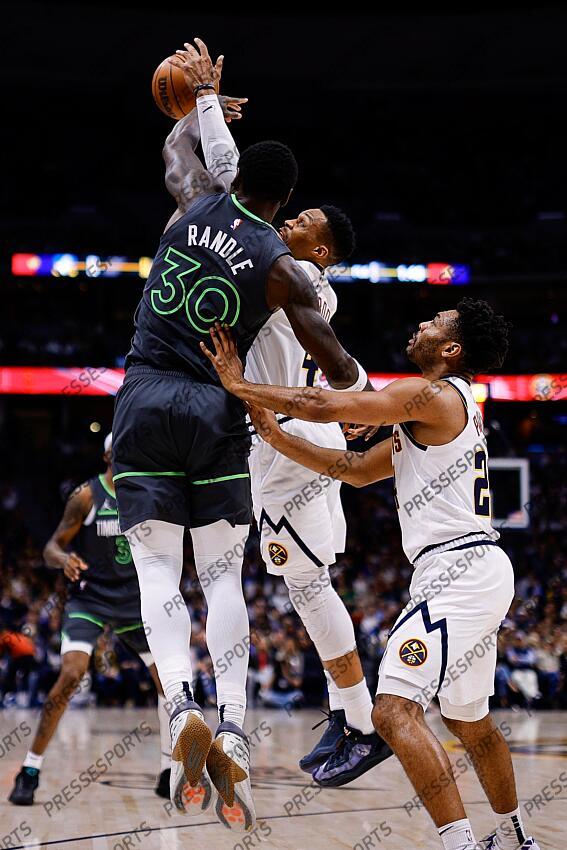 Apr 1, 2025; Denver, Colorado, USA; Denver Nuggets guard Russell Westbrook (4) steals a pass intended for Minnesota Timberwolves forward Julius Randle (30) as guard Jalen Pickett (24) defends in the first quarter at Ball Arena. Mandatory Credit: Isaiah J. Downing-Imagn Images NBA: Minnesota Timberwolves at Denver Nuggets 