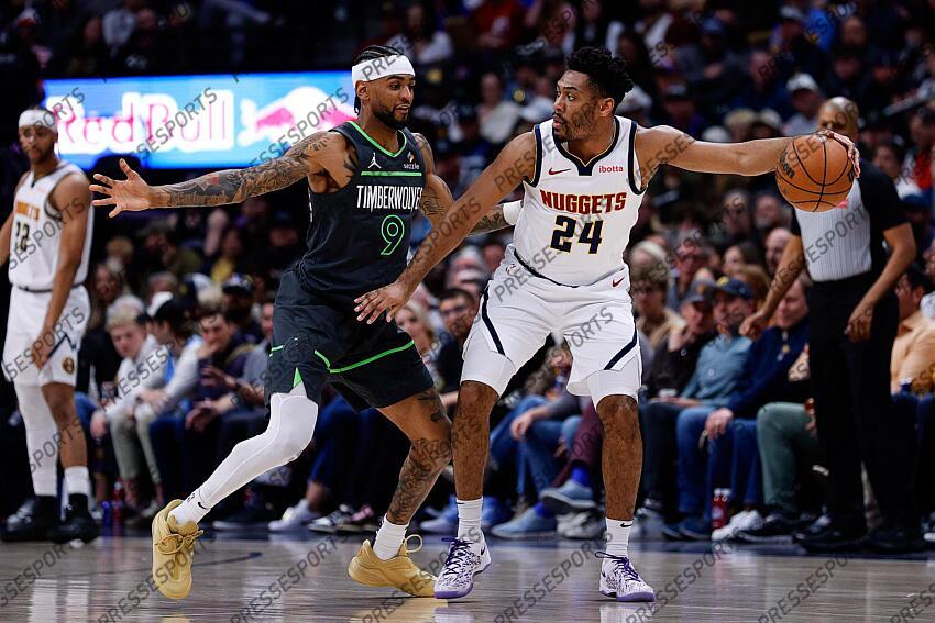 Apr 1, 2025; Denver, Colorado, USA; Denver Nuggets guard Jalen Pickett (24) controls the ball under pressure from Minnesota Timberwolves guard Nickeil Alexander-Walker (9) in the first quarter at Ball Arena. Mandatory Credit: Isaiah J. Downing-Imagn Images NBA: Minnesota Timberwolves at Denver Nuggets 