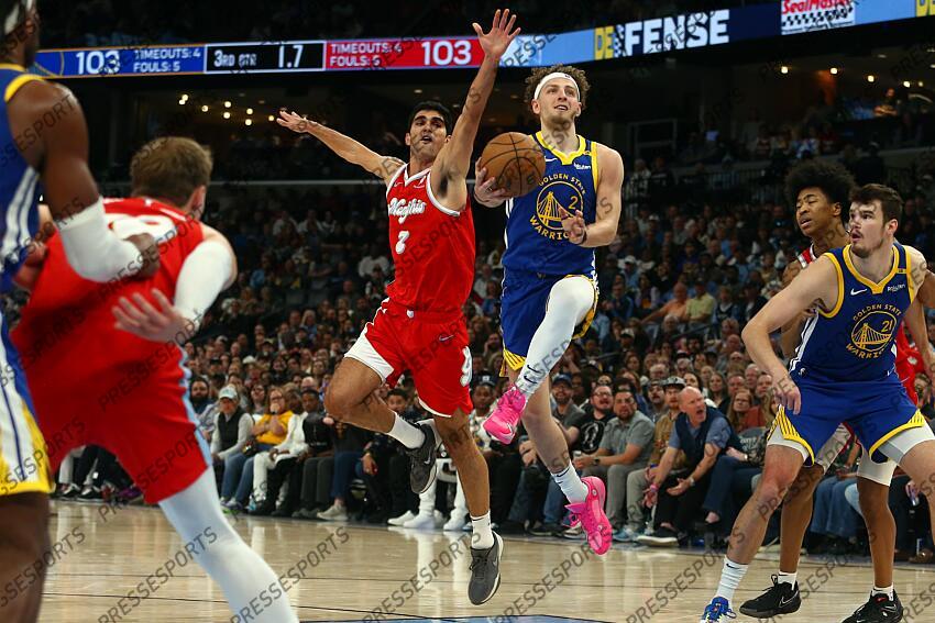 Apr 1, 2025; Memphis, Tennessee, USA; Golden State Warriors guard Brandin Podziemski (2) shoots as Memphis Grizzlies forward Santi Aldama (7) defends during the third quarter at FedExForum. Mandatory Credit: Petre Thomas-Imagn Images NBA: Golden State Warriors at Memphis Grizzlies 
