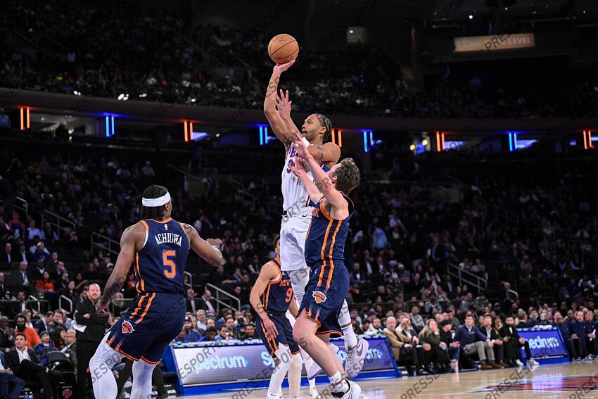 Apr 1, 2025; New York, New York, USA; Philadelphia 76ers forward Marcus Bagley (35) shoots the ball while being defended by New York Knicks guard Tyler Kolek (13) during the second half at Madison Square Garden. Mandatory Credit: John Jones-Imagn Images NBA: Philadelphia 76ers at New York Knicks 