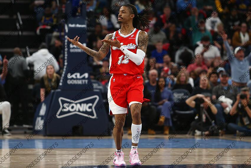 Apr 1, 2025; Memphis, Tennessee, USA; Memphis Grizzlies guard Ja Morant (12) reacts after a basket during the second quarter against the Golden State Warriors at FedExForum. Mandatory Credit: Petre Thomas-Imagn Images NBA: Golden State Warriors at Memphis Grizzlies 