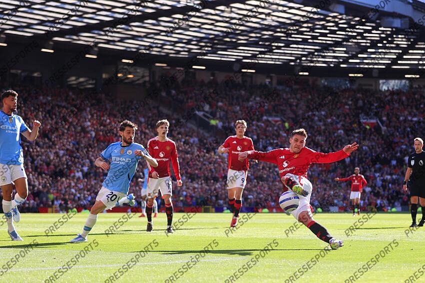 6th April 2025 - Premier League - Manchester United v Manchester City - Manuel Ugarte of Manchester United shoots under pressure from Bernardo Silva of Manchester City - Photo: Simon Stacpoole / Offside. MANCHESTER UNITED-MANCHESTER CITY (0-0) 