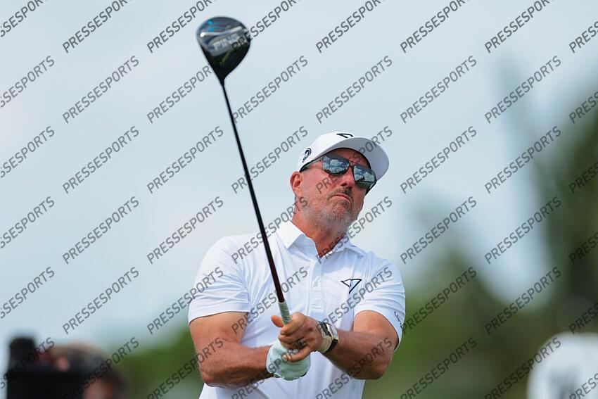 Apr 5, 2025; Miami, Florida, USA; Phil Mickelson plays his shot from the third tee during the second round of the LIV Golf Miami golf tournament at Trump National Doral. Mandatory Credit: Sam Navarro-Imagn Images Golf: LIV Golf Miami - Second Round 
