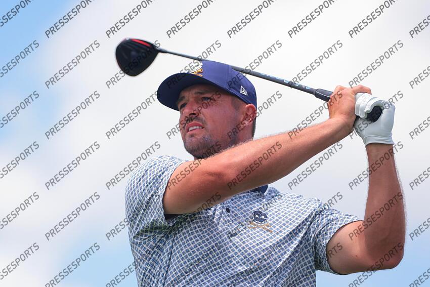 Apr 5, 2025; Miami, Florida, USA; Bryson DeChambeau plays his shot from the eighth tee during the second round of the LIV Golf Miami golf tournament at Trump National Doral. Mandatory Credit: Sam Navarro-Imagn Images Golf: LIV Golf Miami - Second Round 
