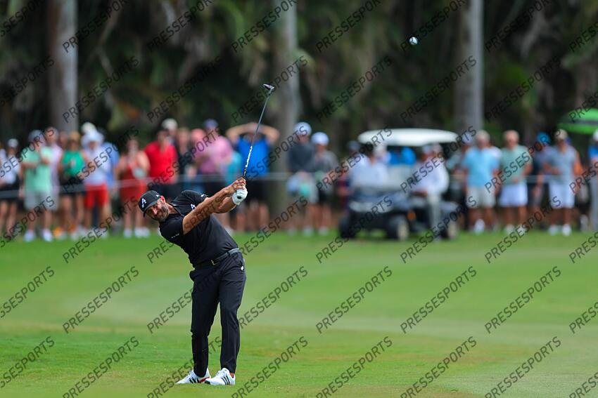 Apr 5, 2025; Miami, Florida, USA; Dustin Johnson plays his shot from the 10th fairway during the second round of the LIV Golf Miami golf tournament at Trump National Doral. Mandatory Credit: Sam Navarro-Imagn Images Golf: LIV Golf Miami - Second Round 