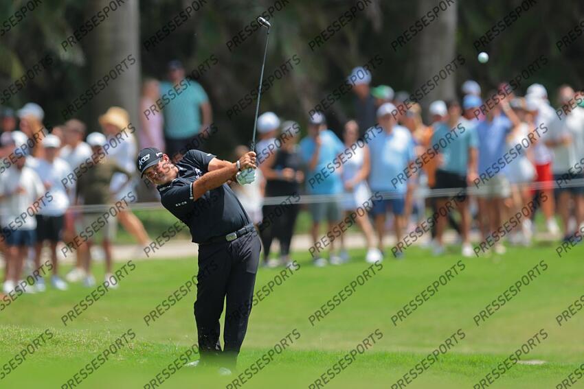 Apr 5, 2025; Miami, Florida, USA; Patrick Reed plays his shot from the 10th fairway during the second round of the LIV Golf Miami golf tournament at Trump National Doral. Mandatory Credit: Sam Navarro-Imagn Images Golf: LIV Golf Miami - Second Round 