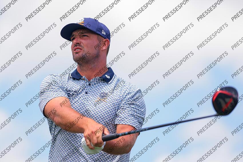 Apr 5, 2025; Miami, Florida, USA; Bryson DeChambeau plays his shot from the eighth tee during the second round of the LIV Golf Miami golf tournament at Trump National Doral. Mandatory Credit: Sam Navarro-Imagn Images Golf: LIV Golf Miami - Second Round 