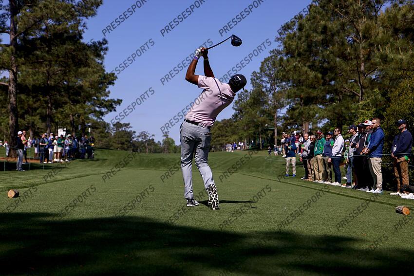 Apr 9, 2025; Augusta, Georgia, USA; Sahith Theegala tees off on no. 15 during a practice round for the Masters Tournament at Augusta National Golf Club. Mandatory Credit: Peter Casey-Imagn Images PGA: Masters Tournament - Practice Round 
