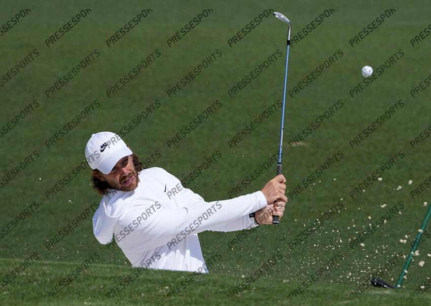 Apr 9, 2025; Augusta, Georgia, USA; Tommy Fleetwood hits onto the no. 2 green during a practice round of the Masters Tournament at Augusta National Golf Club. Mandatory Credit: Kyle Terada-Imagn Images PGA: Masters Tournament - Practice Round 