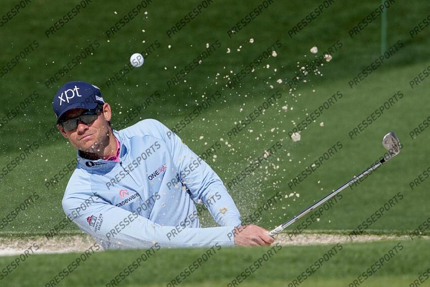 Apr 9, 2025; Augusta, Georgia, USA; Adam Schenk hits out of a bunker on no. 2 during a practice round of the Masters Tournament at Augusta National Golf Club. Mandatory Credit: Kyle Terada-Imagn Images PGA: Masters Tournament - Practice Round 
