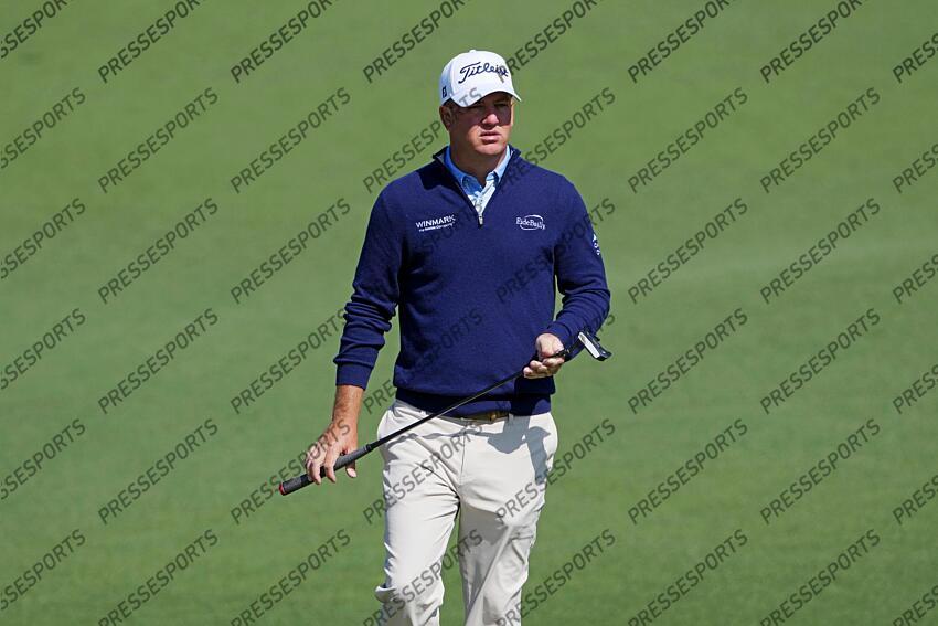 Apr 9, 2025; Augusta, Georgia, USA; Tom Hoge lines up a putt on the second green during a practice round of the Masters Tournament at Augusta National Golf Club. Mandatory Credit: Kyle Terada-Imagn Images PGA: Masters Tournament - Practice Round 