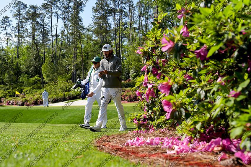 Apr 9, 2025; Augusta, Georgia, USA; Max Homa walks off the no. 13 green during a practice round for the Masters Tournament at Augusta National Golf Club. Mandatory Credit: Katie Goodale-Imagn Images PGA: Masters Tournament - Practice Round 