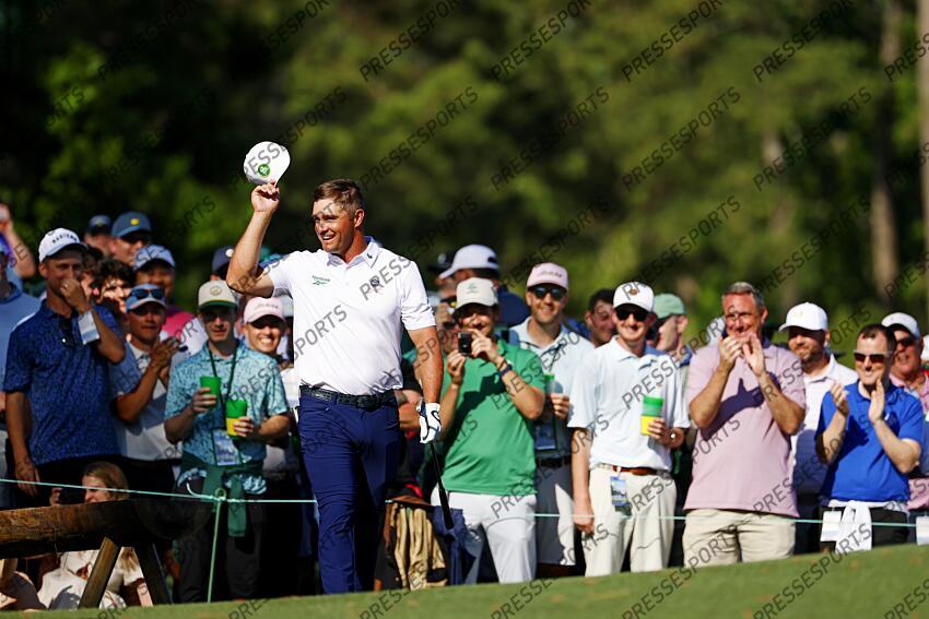 Apr 8, 2025; Augusta, Georgia, USA; Bryson DeChambeau reacts with patrons on the tenth green during a practice round for the Masters Tournament at Augusta National Golf Club. Mandatory Credit: Peter Casey-Imagn Images PGA: Masters Tournament - Practice Round 