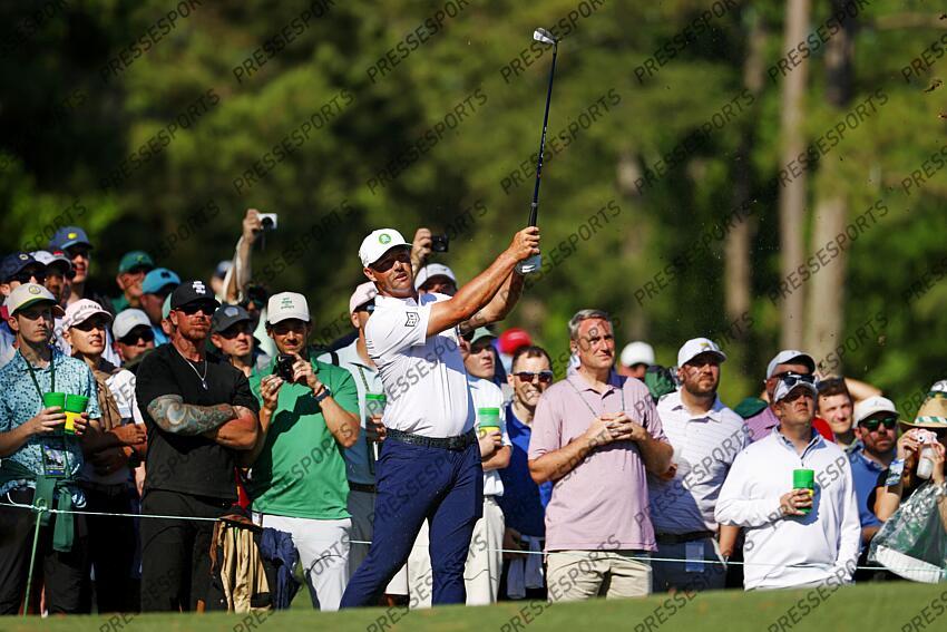 Apr 8, 2025; Augusta, Georgia, USA; Bryson DeChambeau plays on the tenth green during a practice round for the Masters Tournament at Augusta National Golf Club. Mandatory Credit: Peter Casey-Imagn Images PGA: Masters Tournament - Practice Round 