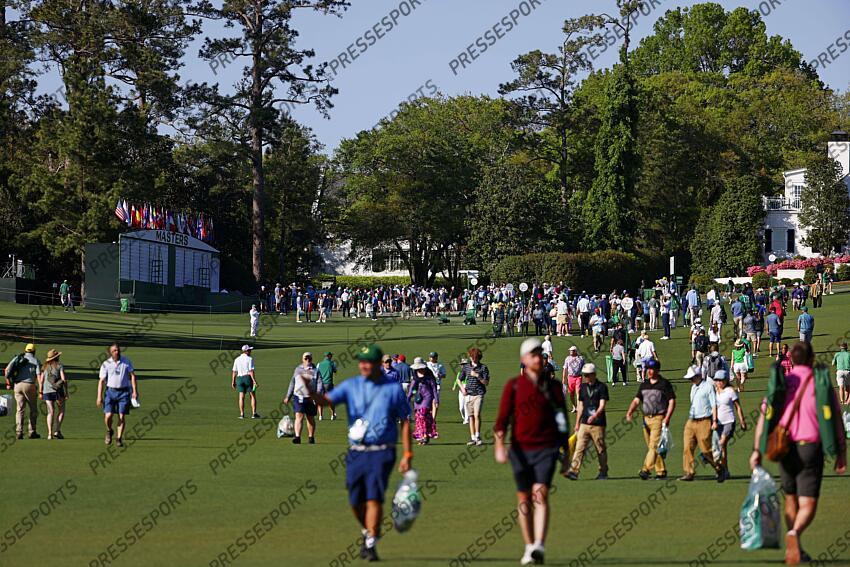 Apr 8, 2025; Augusta, Georgia, USA; Patrons walk along the course during a practice round for the Masters Tournament at Augusta National Golf Club. Mandatory Credit: Peter Casey-Imagn Images PGA: Masters Tournament - Practice Round 