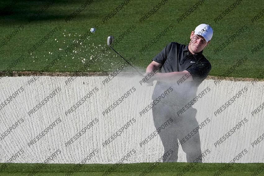Apr 8, 2025; Augusta, Georgia, USA; Robert MacIntyre hits out of a bunker on no. 15 during a practice round for the Masters Tournament at Augusta National Golf Club. Mandatory Credit: Michael Madrid-Imagn Images PGA: Masters Tournament - Practice Round 