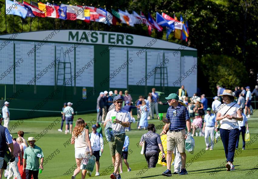 Apr 8, 2025; Augusta, Georgia, USA; Patrons cross the no. 9 fairway during a practice round for the Masters Tournament at Augusta National Golf Club. Mandatory Credit: Katie Goodale-Imagn Images PGA: Masters Tournament - Practice Round 