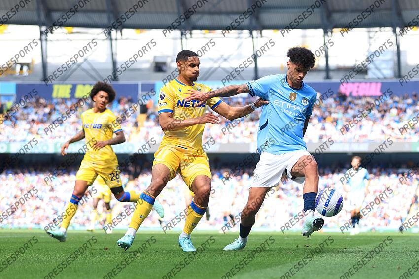 12th April 2025 - Premier League - Manchester City v Crystal Palace - Nico O'Reilly of Manchester City battles with Maxence Lacroix of Crystal Palace - Photo: Simon Stacpoole / Offside. MANCHESTER CITY-CRYSTAL PALACE (5-2) 