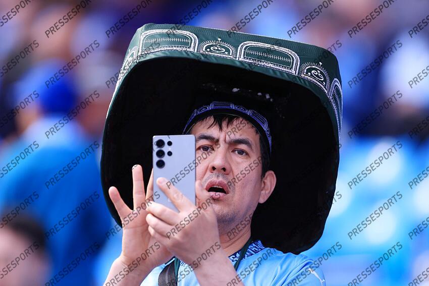 12th April 2025 - Premier League - Manchester City v Crystal Palace - A fan shows his support for Abdukodir Khusanov of Manchester City by wearing a traditional hat from Uzbekistan - Photo: Simon Stacpoole / Offside. MANCHESTER CITY-CRYSTAL PALACE (5-2) 