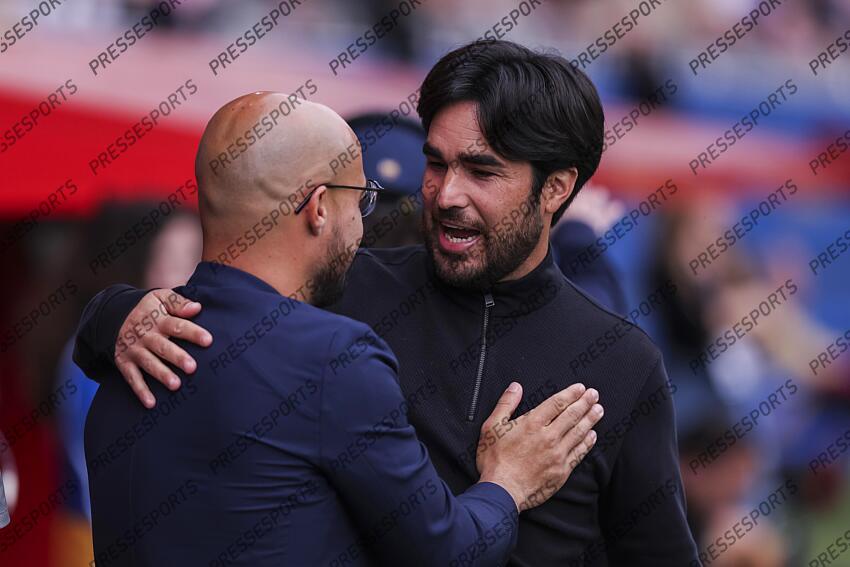 Pere Romeu, head coach of FC Barcelona greets Victor Martin, head coach of Atletico de Madrid during the Spanish Women league, Liga F, football match played between FC Barcelona and Atletico de Madrid at Johan Cruyff Stadium on April 13, 2025 in Sant Joan Despi, Spain. (F) FC BARCELONE-(F) ATLETICO MADRID (6-0) 