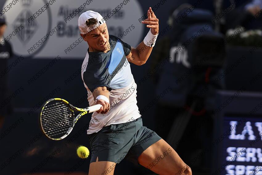 Holge Rune of Denmark in actions against Albert Ramos-Vinolas of Spain during the first round tennis match of the Barcelona Open Banc Sabadell - Conde Godo 2025 Day 1 at Real Club De Tenis Barcelona on April 14, 2025 in Barcelona, Spain. OPEN DE BARCELONE 