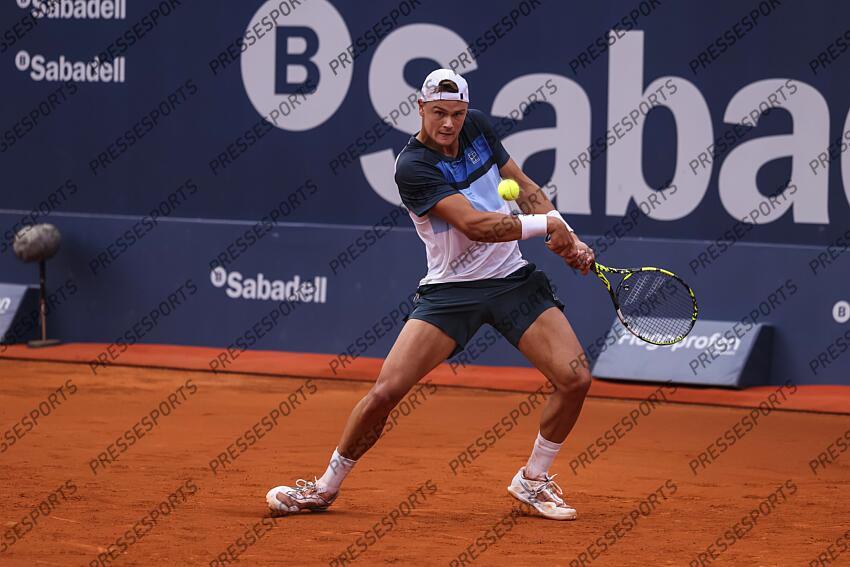 Holge Rune of Denmark in actions against Albert Ramos-Vinolas of Spain during the first round tennis match of the Barcelona Open Banc Sabadell - Conde Godo 2025 Day 1 at Real Club De Tenis Barcelona on April 14, 2025 in Barcelona, Spain. OPEN DE BARCELONE 