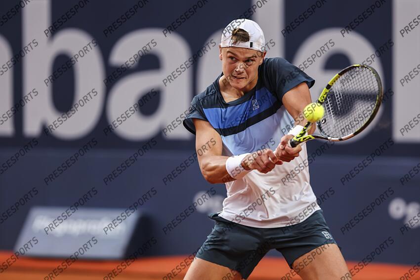 Holge Rune of Denmark in actions against Albert Ramos-Vinolas of Spain during the first round tennis match of the Barcelona Open Banc Sabadell - Conde Godo 2025 Day 1 at Real Club De Tenis Barcelona on April 14, 2025 in Barcelona, Spain. OPEN DE BARCELONE 